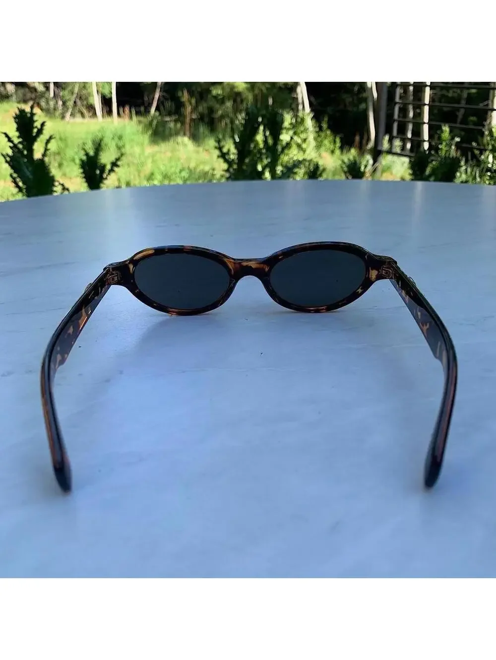 Cyber Star Vintage y2k style cheetah print oval sunglasses. Tinted oval Lenses